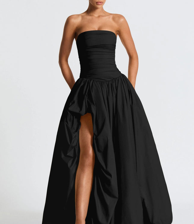 Black strapless ruched maxi dress with high-low hemline and full skirt