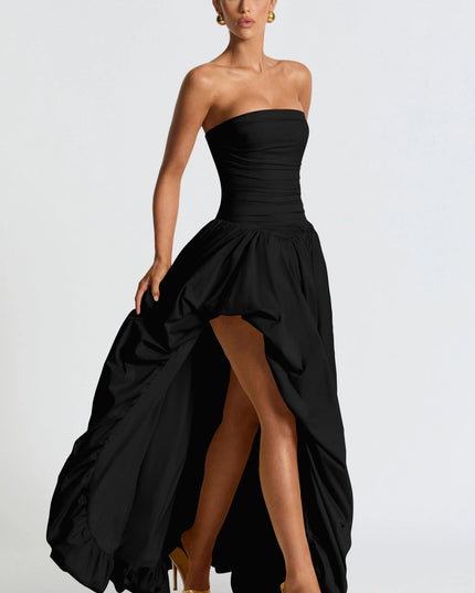 Black strapless high-low maxi dress with ruched bodice and flowing skirt