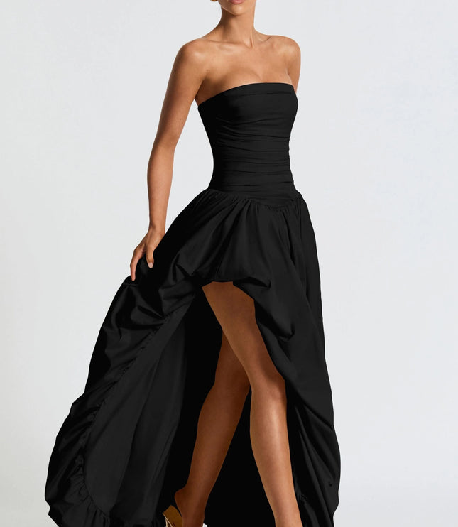 Black strapless high-low maxi dress with ruched bodice and flowing skirt