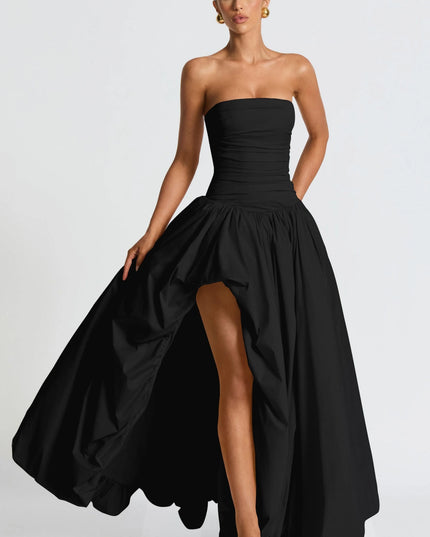 Black ruched strapless maxi dress with asymmetrical high-low hem detail