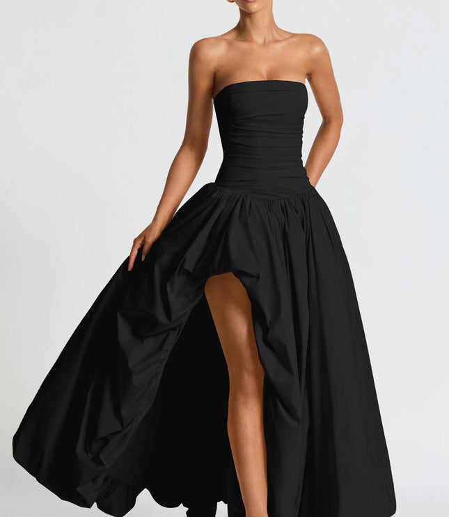 Black ruched strapless maxi dress with asymmetrical high-low hem detail