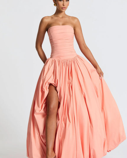 Coral pink strapless ruched maxi dress with high-low asymmetrical hemline