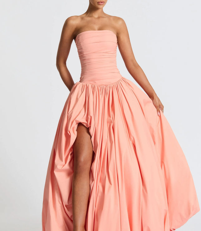 Coral pink strapless ruched maxi dress with high-low asymmetrical hemline
