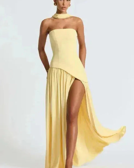 Yellow strapless maxi dress with high slit and flowing skirt detail