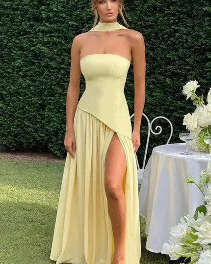 Pale yellow strapless maxi dress with choker neckline and asymmetrical high slit