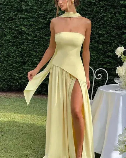 Yellow strapless maxi dress with choker neckline and high slit outdoor styling