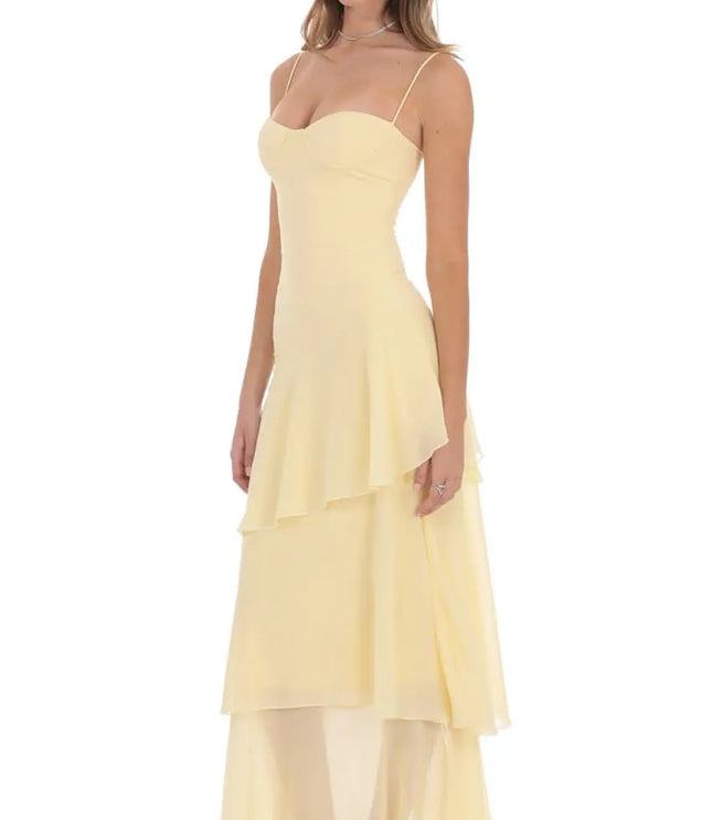 Side view of women sweetheart spaghetti strap layered maxi dress with fitted bodice and flowing layered hem