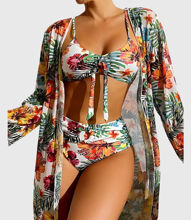 White tropical floral bikini with ruched top, high-waist bottoms, and long-sleeve cover-up robe