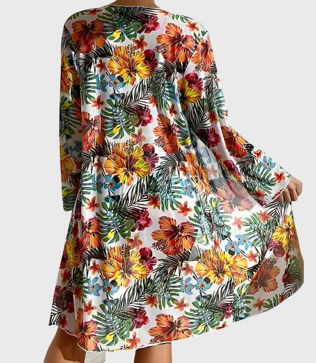 White tropical floral cover-up robe back view with long sleeves and flowing midi length