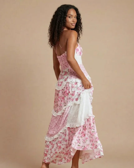 Pink floral wedding guest maxi dress with smocked waist, side back view