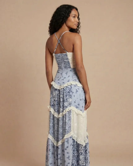 Blue floral maxi dress with cross-back straps and layered ruffles, back view