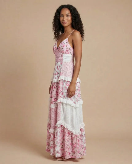 Women's pink floral maxi dress with V-neckline and tiered ruffles, front view