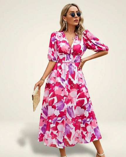 Women pink magenta floral midi dress with puffed sleeves and defined waist