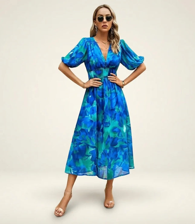 Women blue floral midi dress with V-neckline and voluminous puffed sleeves