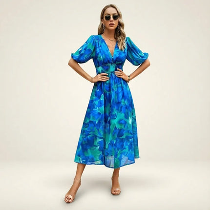 Women blue floral midi dress with V-neckline and voluminous puffed sleeves