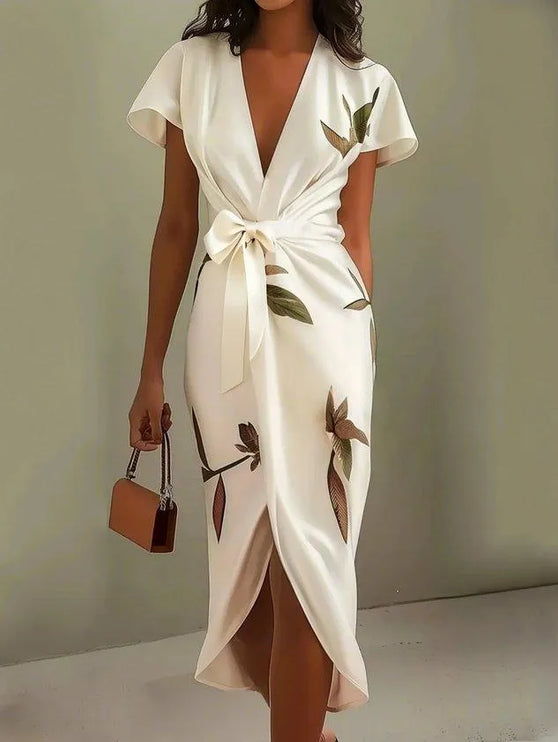 Ivory wrap midi dress with botanical leaf motif and cream bow