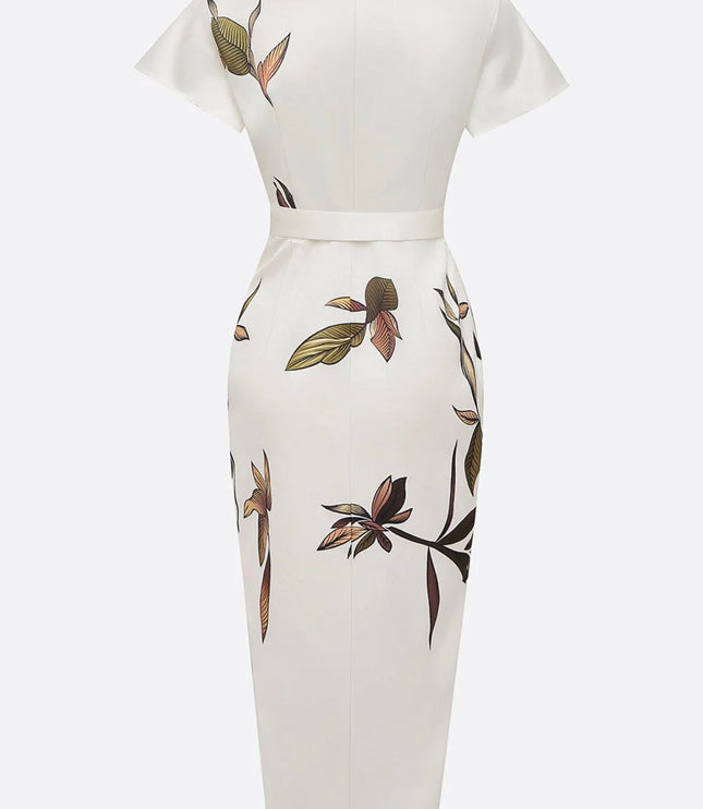 Back view of cream wrap midi dress with leaf print pattern