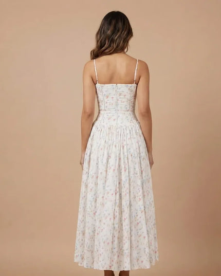 Back view of pastel floral strapless midi dress with fitted bodice and wide skirt