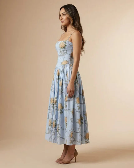 Front view of women floral strapless midi dress in light blue with peach flower print