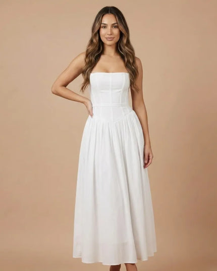 Front view of women floral strapless midi dress in pale green with pink blossoms