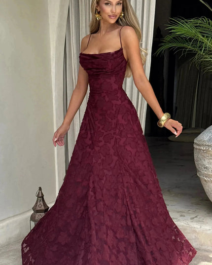 Burgundy floral cowl neck maxi dress angled view showing draped neckline and skirt
