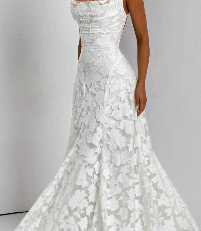White floral cowl neck maxi dress side view with fitted waist and flared hem
