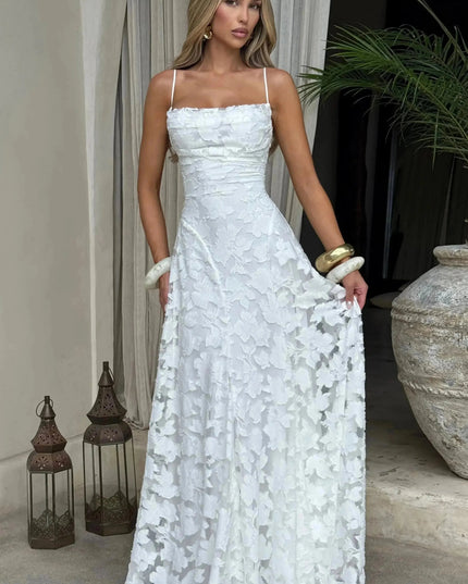 White floral cowl neck maxi dress full length, outdoor front view with flowing skirt