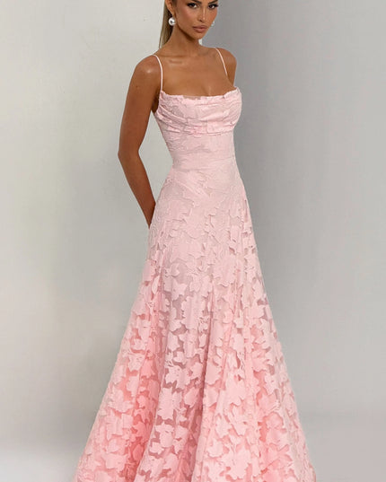 Studio shot blush floral wedding guest maxi dress, cowl neck bodice and A-line skirt