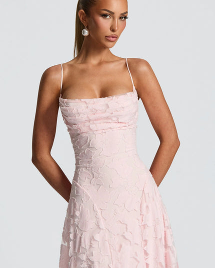 Close-up of blush floral cowl neck bodice with thin straps and textured flower pattern