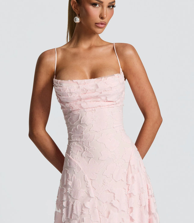 Close-up of blush floral cowl neck bodice with thin straps and textured flower pattern