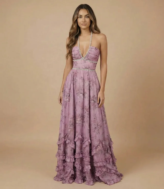 Lavender floral halter maxi dress with deep V neckline, slit, and tiered ruffle hem