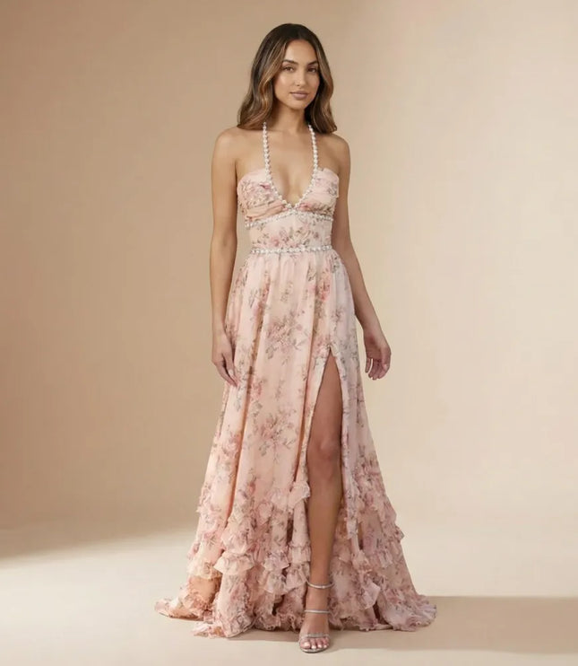 Peach floral halter maxi dress with thigh slit and flowing ruffled skirt