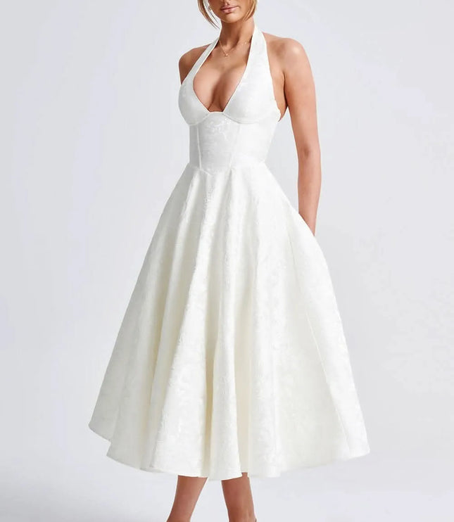White floral halter midi wedding guest dress with deep V neckline and full skirt