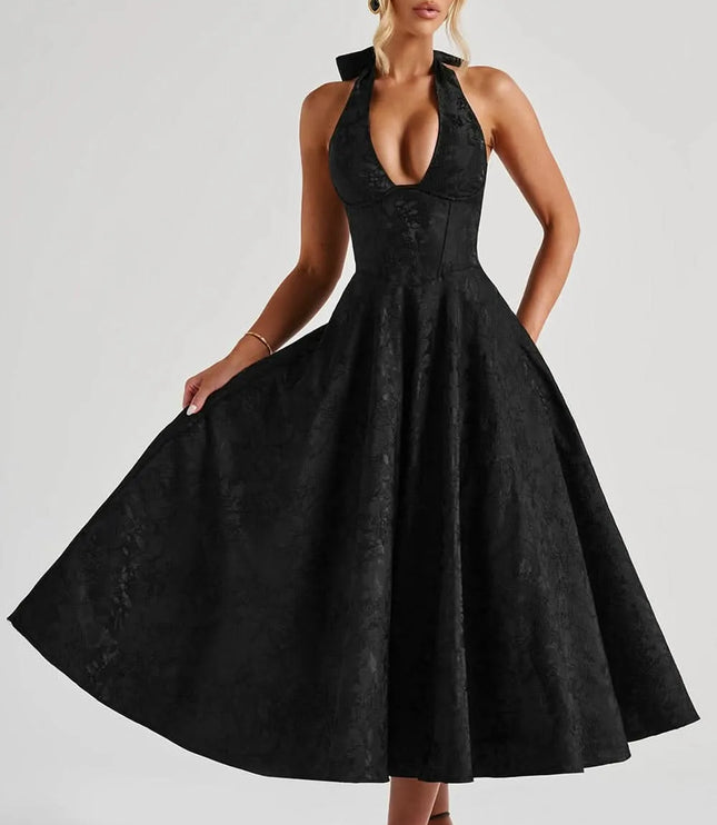 Black floral halter midi wedding guest dress with plunging neckline and voluminous skirt