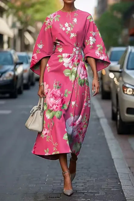 Pink floral kimono sleeve midi dress with belted waist and flowing hem