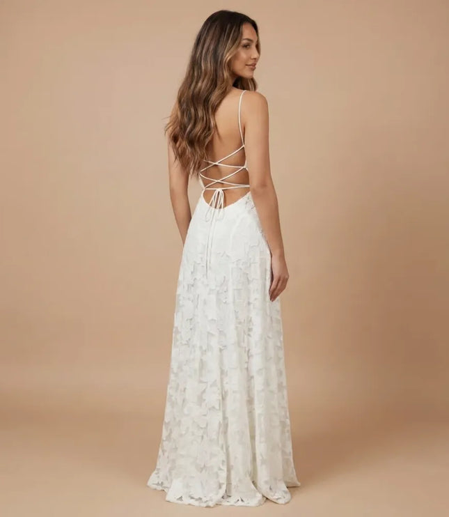Back view of white floral lace maxi dress with crisscross straps and open back design