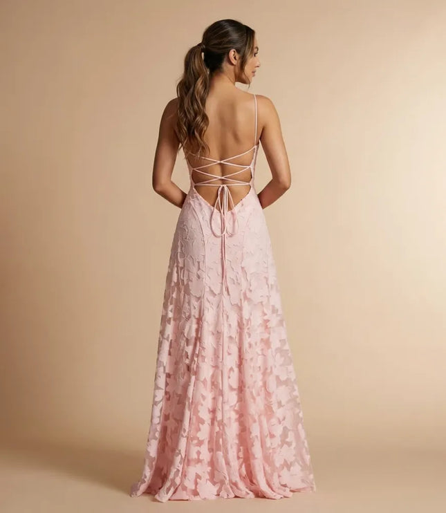 Back view of blush floral lace maxi dress with crisscross straps and open back detail