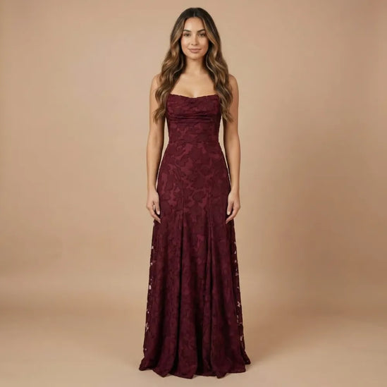 Burgundy floral lace spaghetti strap maxi dress with fitted bodice and flowing skirt