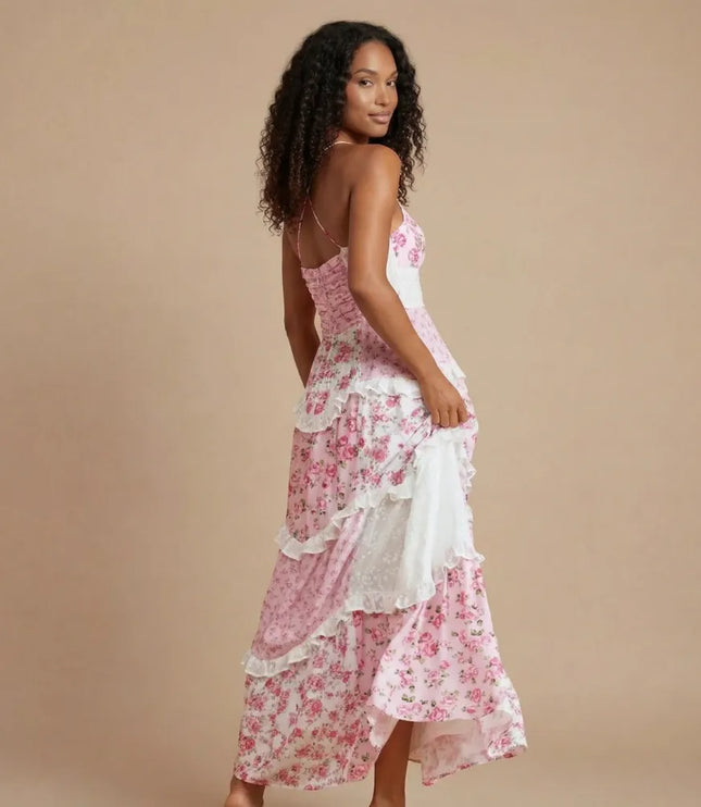 Side view of pink floral patchwork maxi dress with layered ruffles and open back