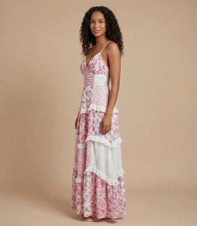 Pink floral patchwork maxi dress with spaghetti straps and tiered ruffle hem