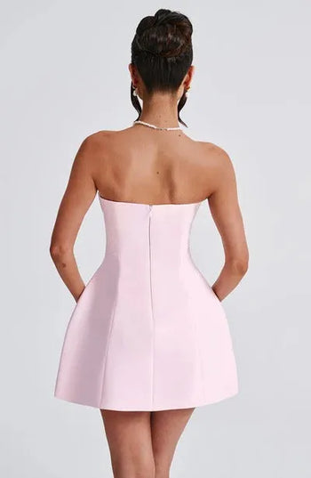 Blush pink strapless bubble mini dress with seamed bodice, back view