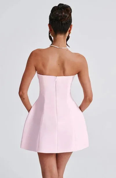 Blush pink strapless bubble mini dress with seamed bodice, back view
