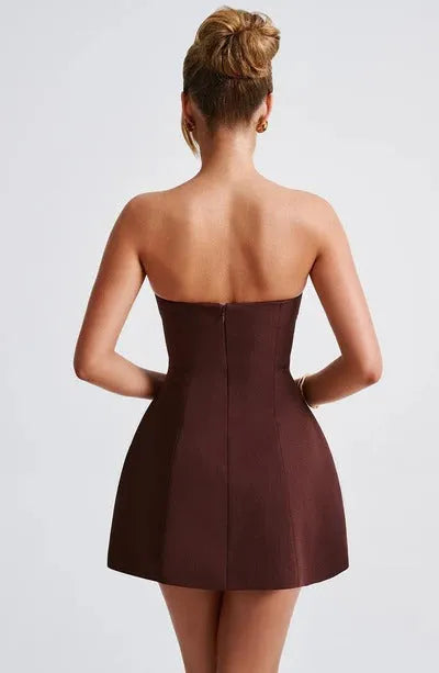 Back view of burgundy strapless bubble mini dress seamed bodice